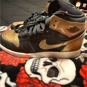 Nike Black and Gold Sneakers